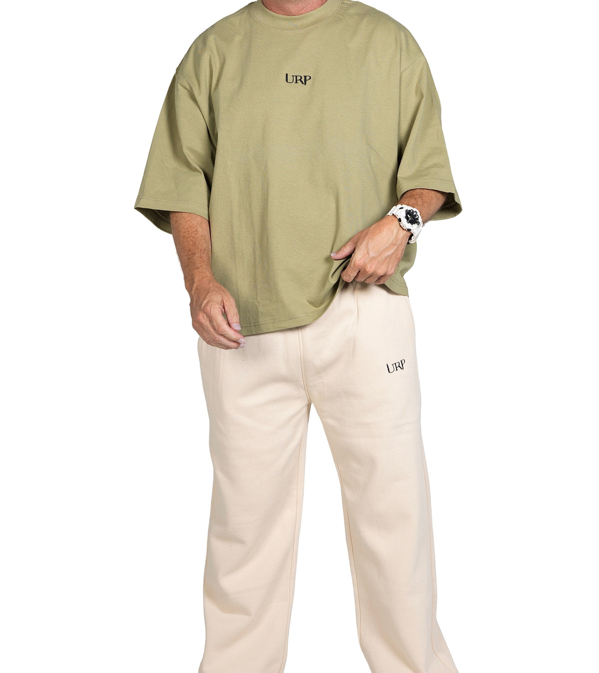 Model wearing the URP Oversized Heavyweight T-Shirt in Green, showing the relaxed fit and front URP logo.