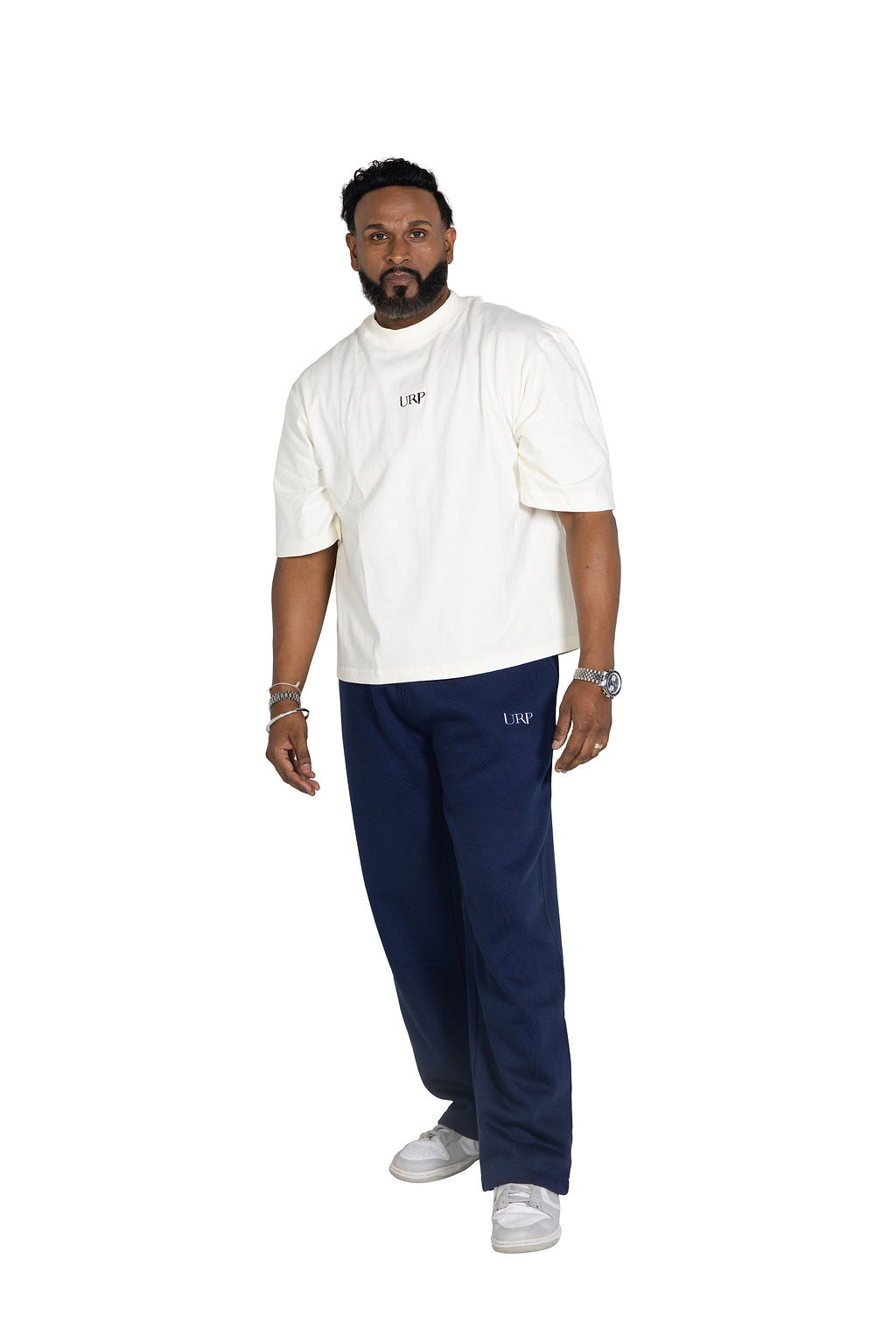 Model wearing blue URP wide-leg joggers, front three-quarter view.